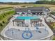 Aerial view of community pool with zero entry area and pool house at 236 Sam Himsel Way, Danville, IN 46122