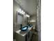 Modern bathroom with dual sinks, stylish lighting fixtures, and attractive vessel sinks at 4143 Graceland Ave, Indianapolis, IN 46208