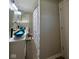 Bathroom featuring dual vessel sinks, modern lighting, and a shower curtain at 4143 Graceland Ave, Indianapolis, IN 46208
