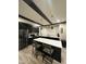 Eat-in kitchen featuring a large island, stainless steel appliances, and a modern design at 4143 Graceland Ave, Indianapolis, IN 46208