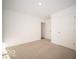 Bright bedroom with neutral carpet and two doors at 6036 Card Blvd, Indianapolis, IN 46221