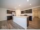 Modern kitchen with island and stainless steel appliances at 6036 Card Blvd, Indianapolis, IN 46221
