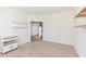Neutral-toned bedroom with storage and wall shelving at 12912 Broncos Dr, Fishers, IN 46037