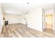 Bright and airy living area with fireplace, hardwood floors, and an open layout at 12912 Broncos Dr, Fishers, IN 46037