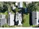 Overhead shot of neighborhood homes surrounded by lush, mature trees and greenery at 335 N Grant Ave, Indianapolis, IN 46201