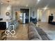 Bright and airy kitchen with a large island, stainless steel appliances, and a casual dining area at 3503 W 100 N, Bargersville, IN 46106