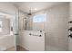 Modern bathroom with a large walk-in shower at 5034 Bergamot Dr, Brownsburg, IN 46112
