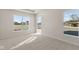 Well-lit bedroom with carpet and multiple windows at 5034 Bergamot Dr, Brownsburg, IN 46112