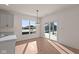 Spacious dining area with hardwood floors and sliding glass doors at 5034 Bergamot Dr, Brownsburg, IN 46112