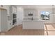 Modern kitchen with white cabinets and double ovens at 5034 Bergamot Dr, Brownsburg, IN 46112
