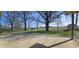 An incredible backyard view from the covered porch, showing off the greenery and treeline at 5861 S 100 W, Fountaintown, IN 46130