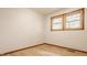 Bedroom with hardwood floors and natural light from the windows at 5861 S 100 W, Fountaintown, IN 46130