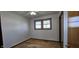 This bedroom has wood floors, a ceiling fan and a window with a view at 5861 S 100 W, Fountaintown, IN 46130