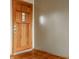 Solid wood front door with side window and lockset at 5861 S 100 W, Fountaintown, IN 46130