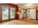 The eat-in kitchen features hardwood floors and a lovely view to the exterior at 5861 S 100 W, Fountaintown, IN 46130