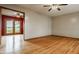 Bright and airy living room with hardwood floors and French doors to exterior at 5861 S 100 W, Fountaintown, IN 46130