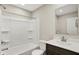 This bathroom features a shower-tub combo, a sink with a wood cabinet, a toilet, and a towel rack at 18415 Depoe Ln, Westfield, IN 46074