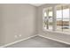 Inviting bedroom with plush carpet and a large window that streams in natural light, creating a calm atmosphere at 18415 Depoe Ln, Westfield, IN 46074