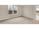 Cozy bedroom featuring soft carpet, neutral walls, and two bright windows at 18415 Depoe Ln, Westfield, IN 46074