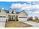 Exterior view featuring a well-manicured lawn, showcasing the inviting curb appeal of this charming residence at 18415 Depoe Ln, Westfield, IN 46074