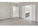 Comfortable carpeted bedroom offering ensuite bathroom and closet access through opened double doors at 18415 Depoe Ln, Westfield, IN 46074