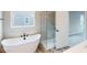 Luxurious bathroom with soaking tub and walk-in shower at 5005 Carmine St, Brownsburg, IN 46112