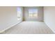 Well-lit bedroom with carpet and large windows at 5005 Carmine St, Brownsburg, IN 46112
