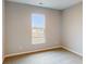 Simple bedroom with carpet flooring and a window with natural light at 5005 Carmine St, Brownsburg, IN 46112