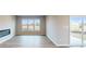 Bright Gathering room featuring a fireplace and sliding glass door at 5005 Carmine St, Brownsburg, IN 46112