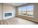 Relaxing living room with fireplace and large window at 5005 Carmine St, Brownsburg, IN 46112