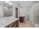 Spa-like bathroom featuring double sinks, a walk-in shower, and stylish finishes at 5021 Carmine St, Brownsburg, IN 46112