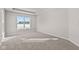 Spacious bedroom with carpeted floors and large windows at 5021 Carmine St, Brownsburg, IN 46112
