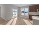Bright dining area with hardwood floors and sliding glass doors at 5021 Carmine St, Brownsburg, IN 46112