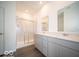 Bathroom with double vanity and walk-in shower at 245 Lar Lan Dr, Danville, IN 46122