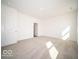 Spacious bedroom with neutral carpeting and ample closet space at 245 Lar Lan Dr, Danville, IN 46122