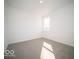 Bedroom with carpet, natural light from a window, and minimalist design at 245 Lar Lan Dr, Danville, IN 46122