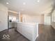 Open kitchen with stainless appliances and quartz countertops at 245 Lar Lan Dr, Danville, IN 46122