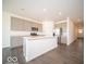 Modern kitchen featuring a large island, stainless steel appliances, and sleek cabinetry for a chef-inspired experience at 245 Lar Lan Dr, Danville, IN 46122