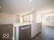 Bright kitchen features stainless steel appliances and a large island at 245 Lar Lan Dr, Danville, IN 46122