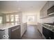 Bright kitchen features stainless steel appliances and a large island at 245 Lar Lan Dr, Danville, IN 46122