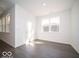 Sunlit living room with luxury vinyl plank flooring at 245 Lar Lan Dr, Danville, IN 46122