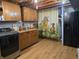 Finished basement area with cabinetry, laundry and unique shower curtain at 6605 Donnelly Dr, Brownsburg, IN 46112