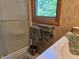 Bathroom featuring a shower, tub, and natural light from the window at 6605 Donnelly Dr, Brownsburg, IN 46112