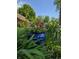 Beautiful landscaping with a large blue flower pot and lots of colorful flowers at 6605 Donnelly Dr, Brownsburg, IN 46112