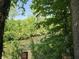A serene view of the river framed by lush greenery creates a peaceful retreat in a natural environment at 6605 Donnelly Dr, Brownsburg, IN 46112