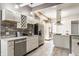 Updated kitchen with stainless steel appliances, ample cabinet space and granite countertops at 2036 N Talbott St, Indianapolis, IN 46202