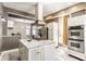 Modern kitchen with stainless steel appliances, center island, and ample cabinet space at 2036 N Talbott St, Indianapolis, IN 46202
