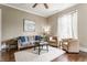 Inviting living room with comfortable seating, hardwood floors, neutral palette, and natural light at 2036 N Talbott St, Indianapolis, IN 46202