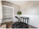 Office with built-in shelves, desk, a gray chair and dark rug at 2036 N Talbott St, Indianapolis, IN 46202