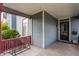 Inviting covered porch with classic architectural details, space for seating, and a view of the street at 2036 N Talbott St, Indianapolis, IN 46202